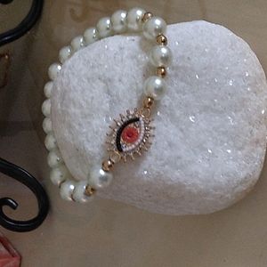 Pearl evil eye bracelet